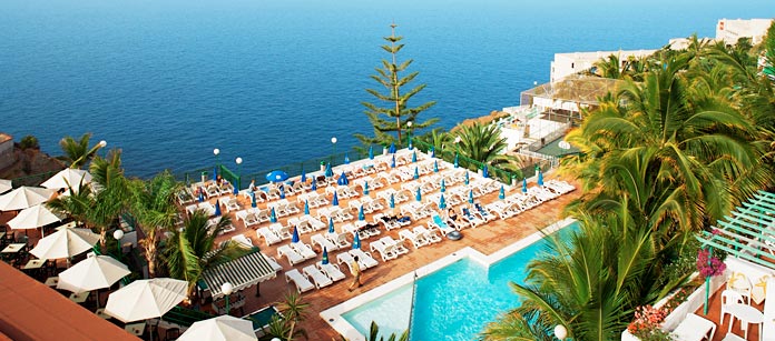 Tilbring ferien på et familiehotell.